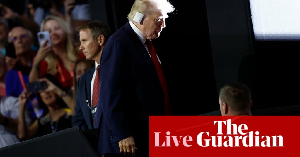 Trump joins crowd at Republican convention hall with bandaged ear, in first public appearance assassination attempt – live