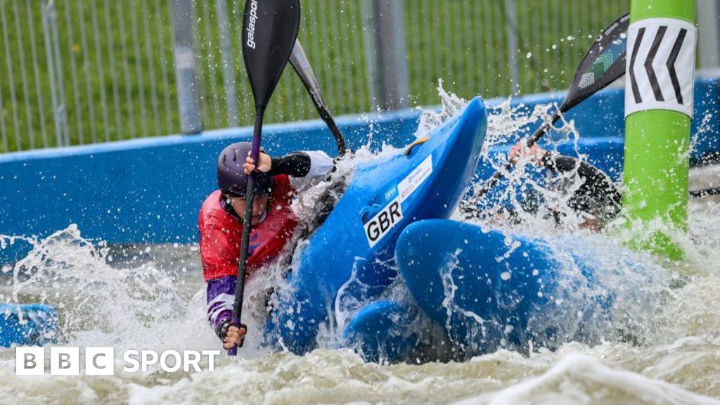 Kimberley Woods competes in kayak cross at the World Championships