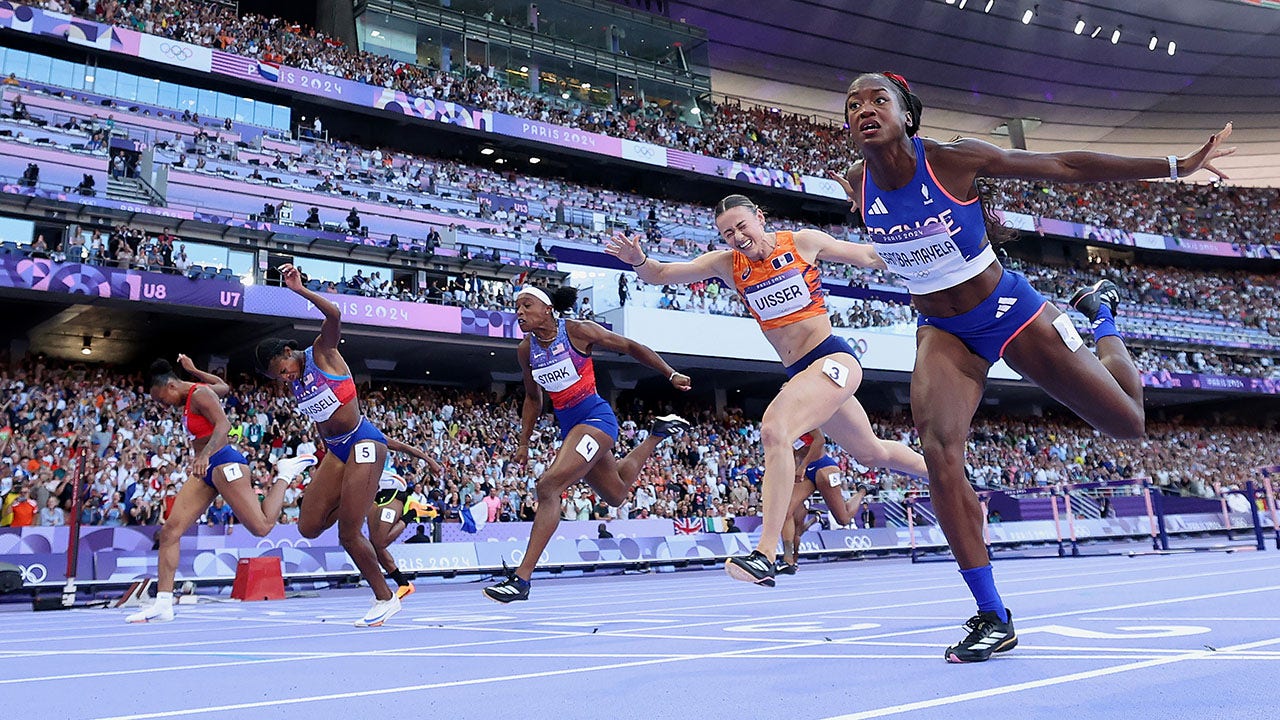 American Masai Russell wins gold in women's 100-meter hurdles