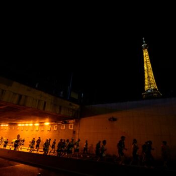 Amateur runners race like Olympians along the same iconic route as competitors in Paris