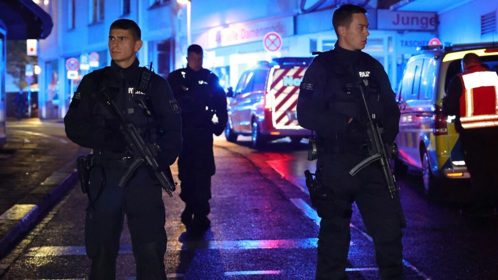 Armed police and ambulances gather in Solingen, Germany. (Pic: AP)