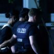 Police officers detain a person in Solingen, Germany. Pic: Reuters