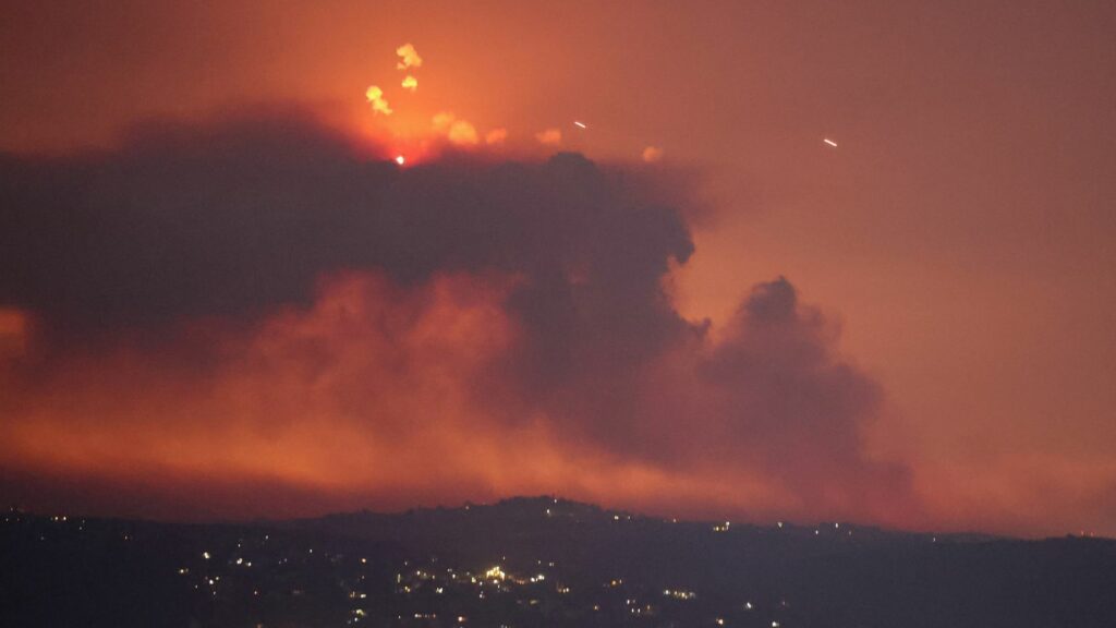 A view shows smoke on the Lebanese side of the border with Israel, after Israel said it had noted armed group Hezbollah preparing to attack Israel and had carried out pre-emptive strikes on Hezbollah targets in Lebanon, as seen from Tyre, southern Lebanon August 25, 2024. REUTERS/Aziz Taher