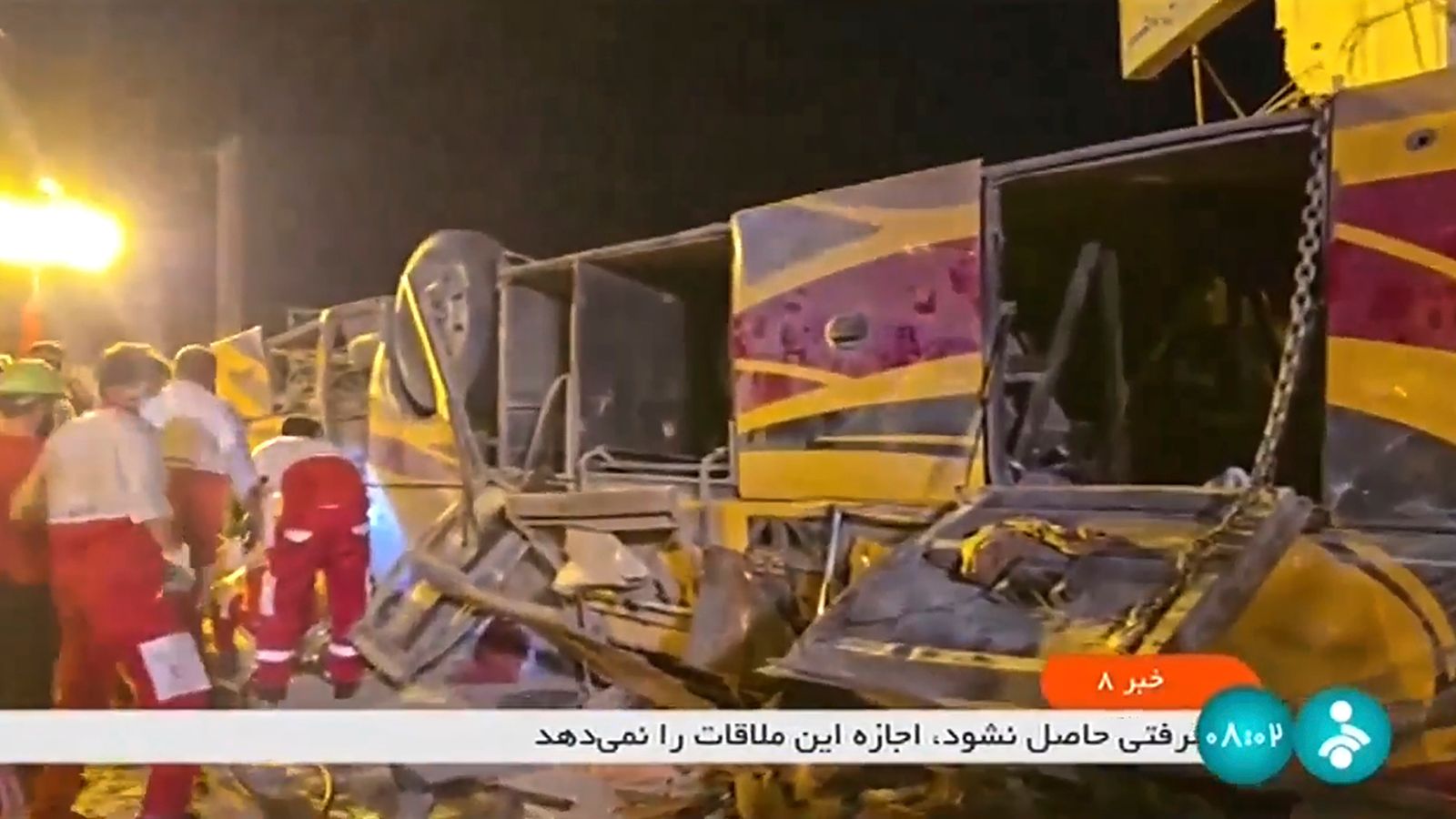 This image taken from a video released by Iranian state television shows the aftermath of a bus crash near Taft, Iran, early Wednesday, Aug. 21, 2024. A bus carrying Shiite pilgrims from Pakistan to Iraq crashed in central Iran, killing multiple people, an official said Wednesday. (Iranian state television via AP)