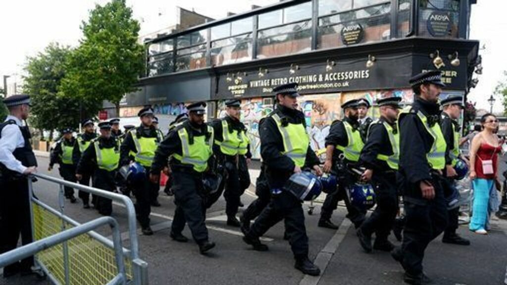 Police officers in Ladbroke Grove for the closing day of the celebrations. Pic: PA