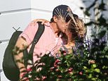 Blake Lively breaks cover for the first time since It Ends with Us drama exploded as she clings to husband Ryan Reynolds while they hunker down at Taylor Swift's celeb-packed mansion