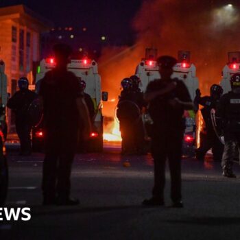 Clean-up begins in south Belfast after night of disorder