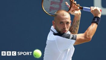 Dan Evans hits a backhand return in his US Open first-round match against Karen Khachanov