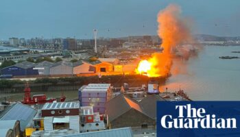 Fire crews tackle blaze after ‘pre-planned’ film set explosions near the O2