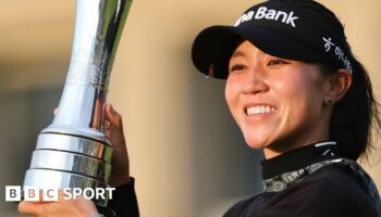 Lydia Ko with the AIG Women's Open trophy