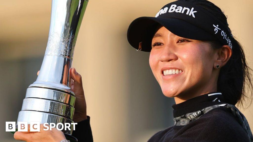 Lydia Ko with the AIG Women's Open trophy