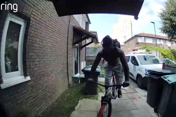 Man left red-faced after riding bike head first into front door on Ring doorbell camera