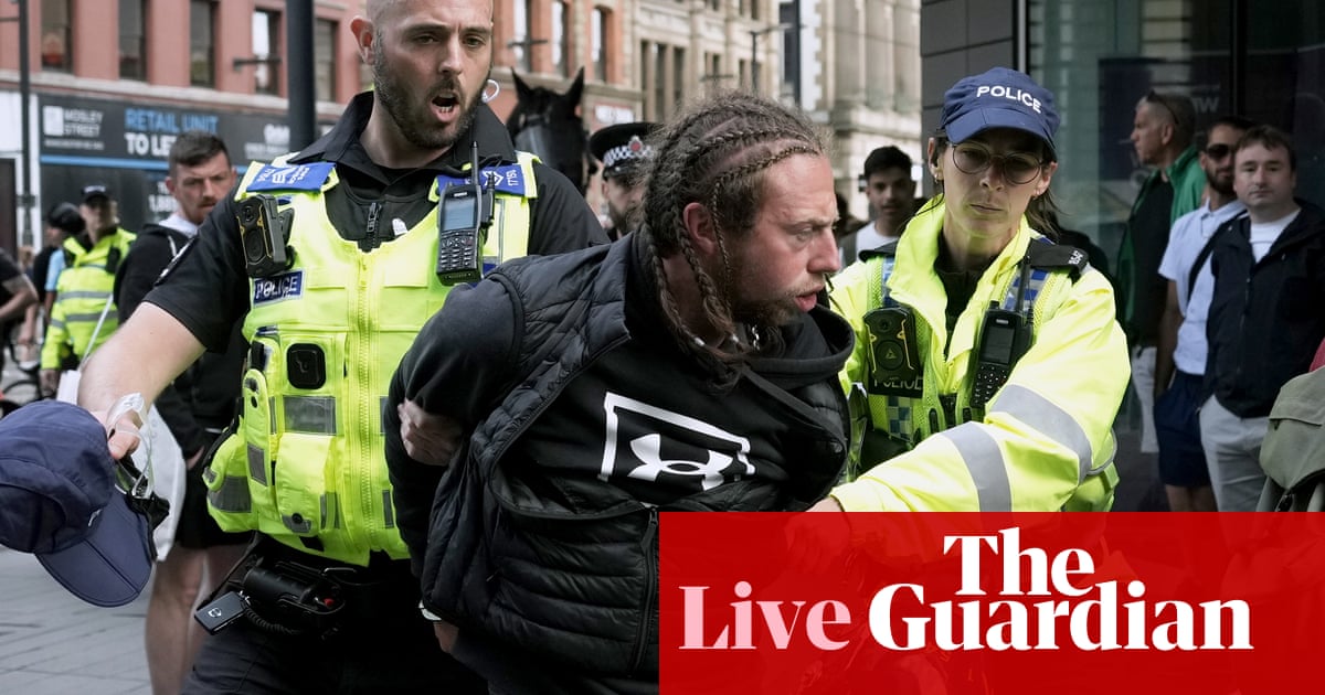 Manchester police issue dispersal order as far right face off with anti-racism protesters – live