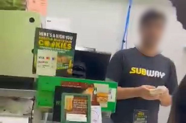 Moment Subway worker launches footlong cookie at dad before he 'returns fire'