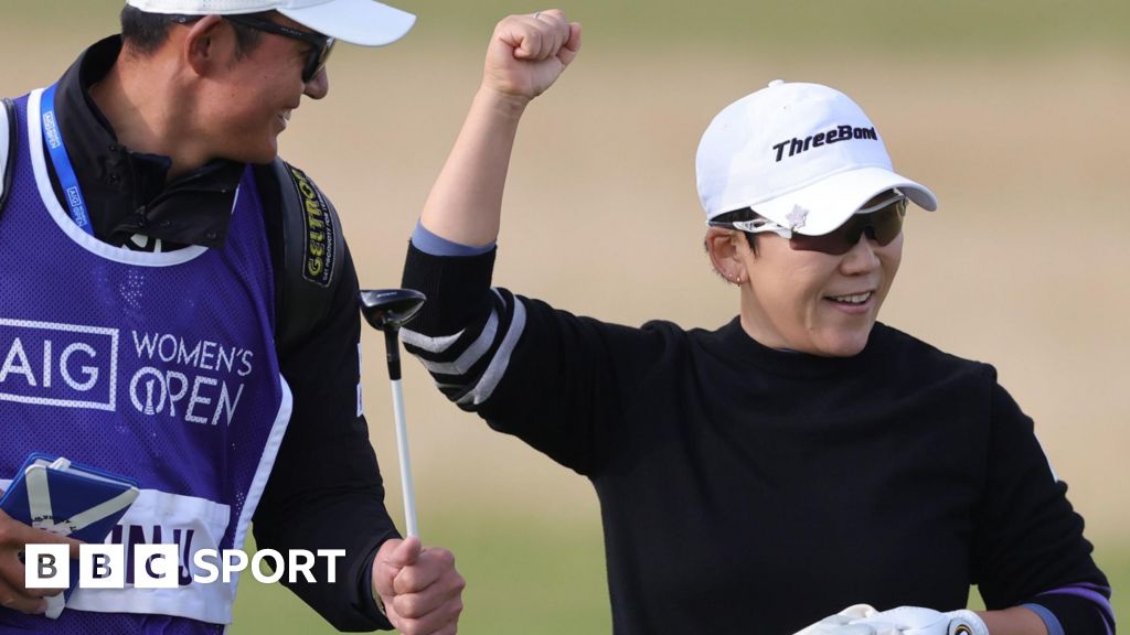 Jiyai Shin celebrates with her caddie during the third round of the 2024 Women's Open