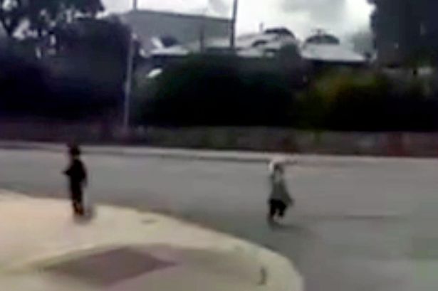 Watch heart stopping moment kids wander out of nursery onto busy road in front of traffic