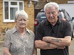 We blew our life savings on a row over two fence panels: Couple spent £45,000 in legal fees to fight boundary neighbour installed on their driveway