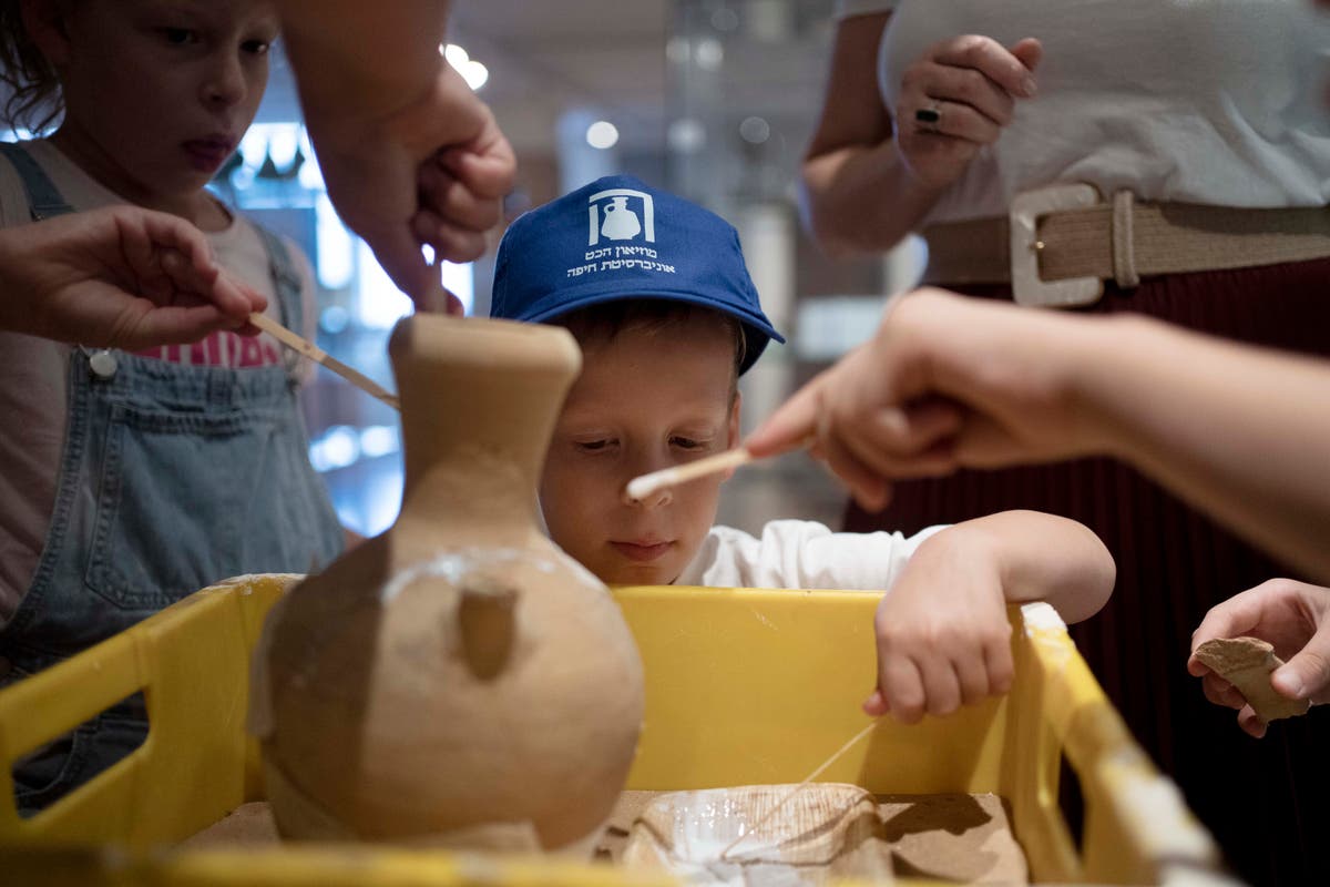 Boy who broke 3,500-year-old artefact welcomed back to museum