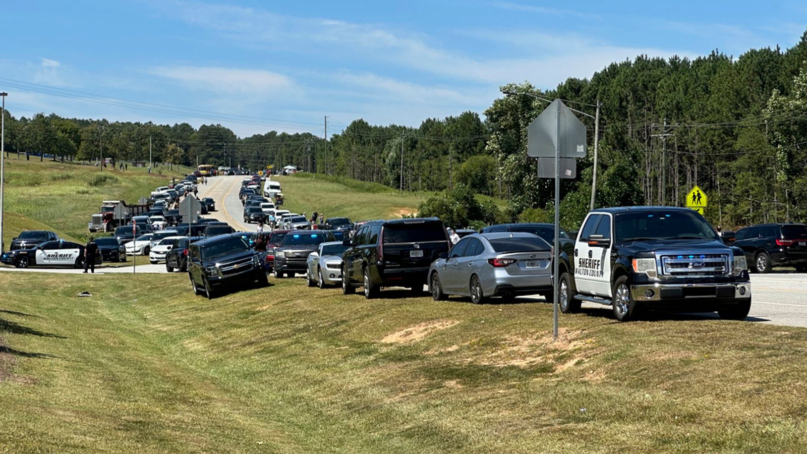 Officers arrive after reports of a shooting at Apalachee High School. Pic: AP Photo/Jeff Amy