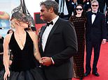 Lady Gaga shares a red carpet kiss with devoted  fiancé Michael Polansky at the 81st annual Venice Film Festival after arriving in a dramatic quilted gown and headdress as she joins Joaquin Phoenix and his sister Rain at Joker: Folie à Deux premiere