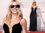 Sienna Miller, 42, hits the red carpet in extreme plunging black gown which shows off her ample cleavage as her incredible post-baby 'Siennaissance' continues