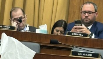 Dem Rep. Nadler pictured with head down, eyes closed during testimony from mothers of migrant crime victims