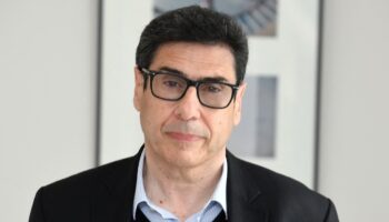 French Economist Philippe Aghion poses at the College de France in Paris on June 08, 2021. (Photo by Eric PIERMONT / AFP)