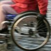 Une personne handicapées dans un fauteuil roulant. Photo d'illustration.