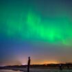 The aurora borealis, also known as the northern lights, glow on the horizon at Another Place by Anthony Gormley, Crosby Beach, Liverpool , Merseyside . Picture date: Friday May 10, 2024. PA Photo. See PA story WEATHER Aurora. Photo credit should read: Peter Byrne/PA Wire