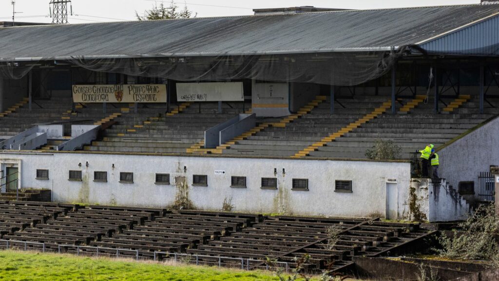 Workmen at Casement Park GAA stadium in Belfast, Northern Ireland. Contractors have begun assessing planned ground works at Casement Park ahead of the long-delayed redevelopment of the stadium.The maintenance and pre-enabling works will run until April, when the demolition of the existing terraces will begin. The GAA is undertaking the initial phase of works amid continued uncertainty over the funding of the redevelopment. The stadium in west Belfast has been earmarked for matches at the Euro 20