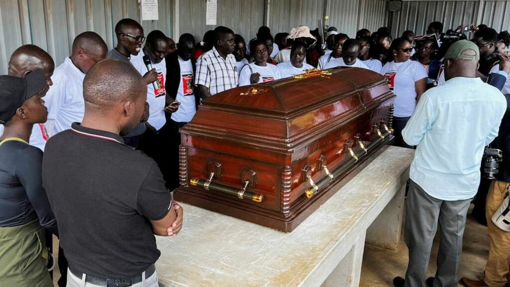 Family members mourn and react next to the coffin of the slain Olympian Rebecca Cheptegei, who died after her former boyfriend doused her in petrol and set her ablaze, at the Moi Teaching & Referral Hospital (MTRH) funeral home, in Eldoret, Kenya September 13, 2024. REUTERS/Edwin Waita