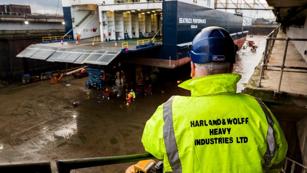 Joe Passmore looking on as workers at Harland and Wolff in Belfast begin work on the first ship to go through refit at the yard since the takeover by London-based energy company InfraStrata stepped in with a ??6m rescue deal that saved from yard from closure.