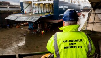 Joe Passmore looking on as workers at Harland and Wolff in Belfast begin work on the first ship to go through refit at the yard since the takeover by London-based energy company InfraStrata stepped in with a ??6m rescue deal that saved from yard from closure.