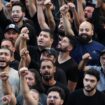 Men react as they attend the funeral for people who were killed amid the detonation of pagers across Lebanon, in Beirut, Lebanon September 18, 2024. REUTERS/Mohamed Azakir