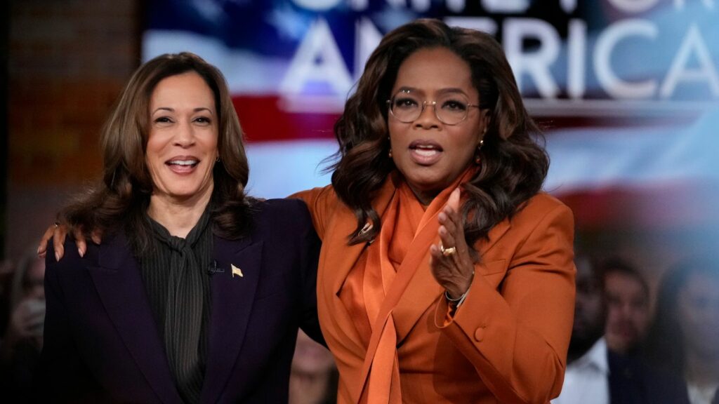 Democratic presidential nominee Vice President Kamala Harris joins Oprah Winfrey at Oprah's Unite for America Live Streaming event Thursday, Sept. 19, 2024 in Farmington Hills, Mich. (AP Photo/Paul Sancya)