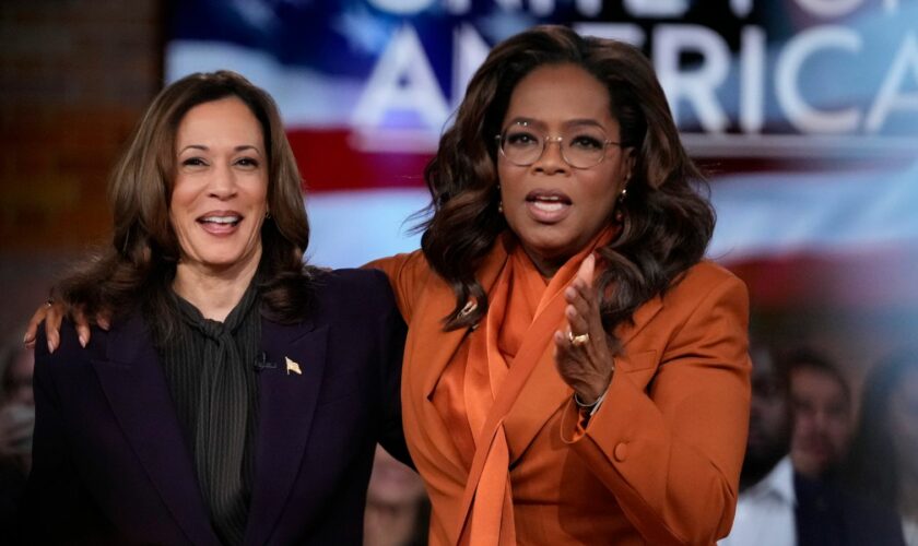 Democratic presidential nominee Vice President Kamala Harris joins Oprah Winfrey at Oprah's Unite for America Live Streaming event Thursday, Sept. 19, 2024 in Farmington Hills, Mich. (AP Photo/Paul Sancya)