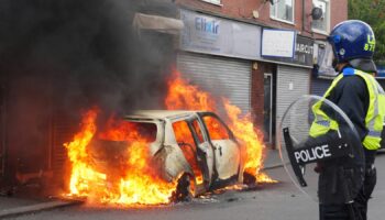 A car after it was set on fire by rioters in Middlesbrough on Sunday 4 August. Pic: PA