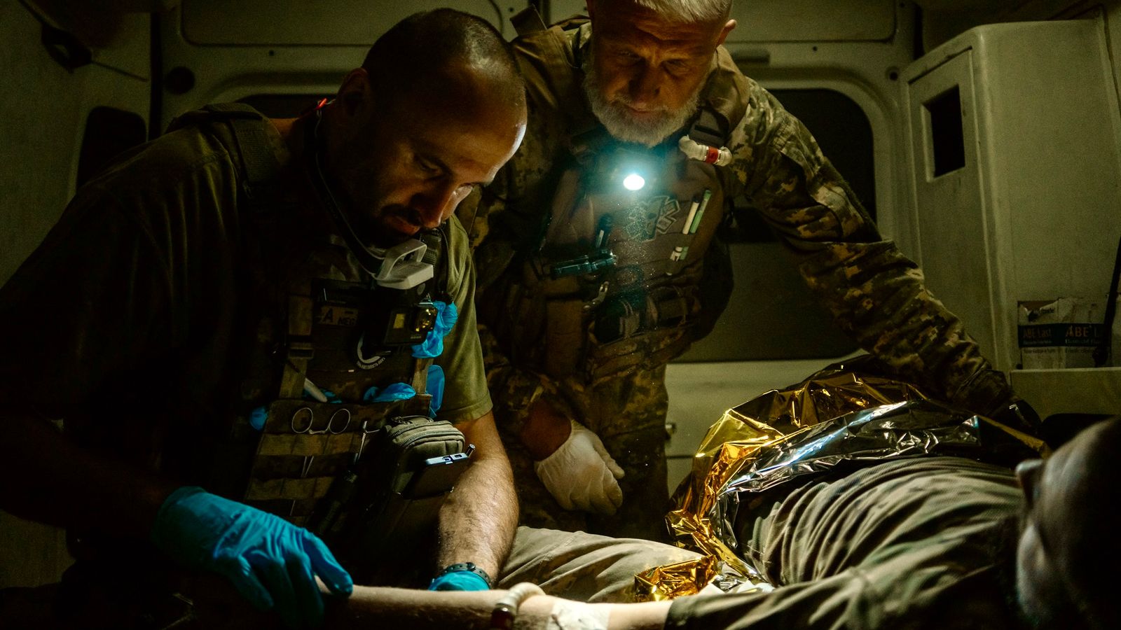 Yaroslav giving first aid in the ambulance. Pic: Alex Rossi