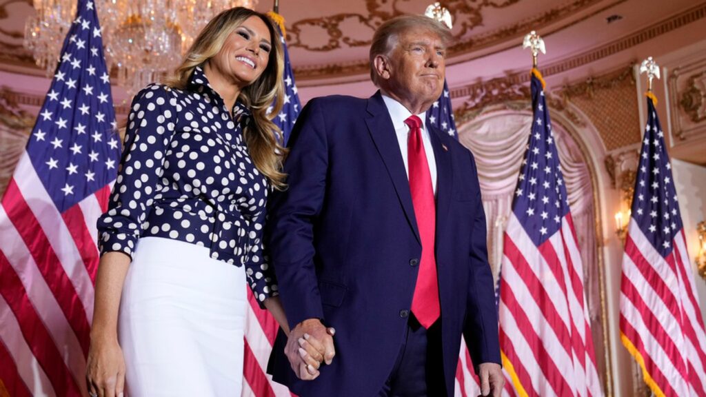 FILE - Former President Donald Trump stands on stage with former first lady Melania Trump after he announced a run for president for the third time at Mar-a-Lago in Palm Beach, Fla., Nov. 15, 2022. (AP Photo/Andrew Harnik, File)