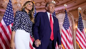 FILE - Former President Donald Trump stands on stage with former first lady Melania Trump after he announced a run for president for the third time at Mar-a-Lago in Palm Beach, Fla., Nov. 15, 2022. (AP Photo/Andrew Harnik, File)