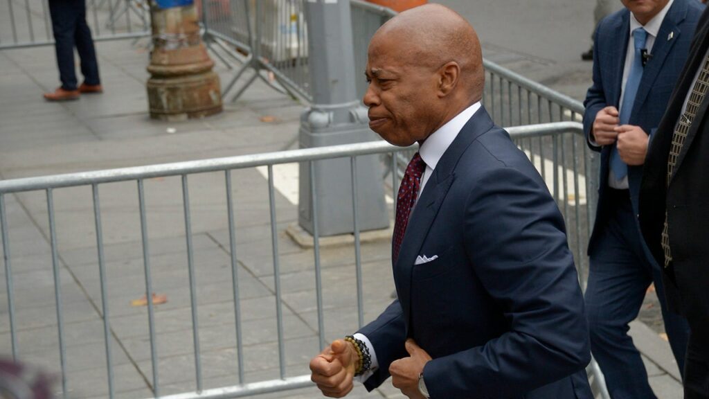 NYC Mayor Eric Adams arrives to turn himself in to face charges in federal corruption case