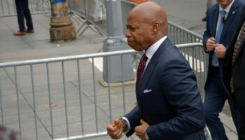 NYC Mayor Eric Adams arrives to turn himself in to face charges in federal corruption case