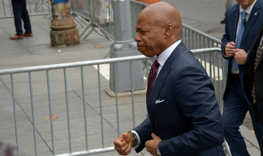 NYC Mayor Eric Adams arrives to turn himself in to face charges in federal corruption case