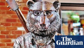 Artists ‘absolutely heartbroken’ after $60,000 bike-riding bear statue stolen from Melbourne laneway