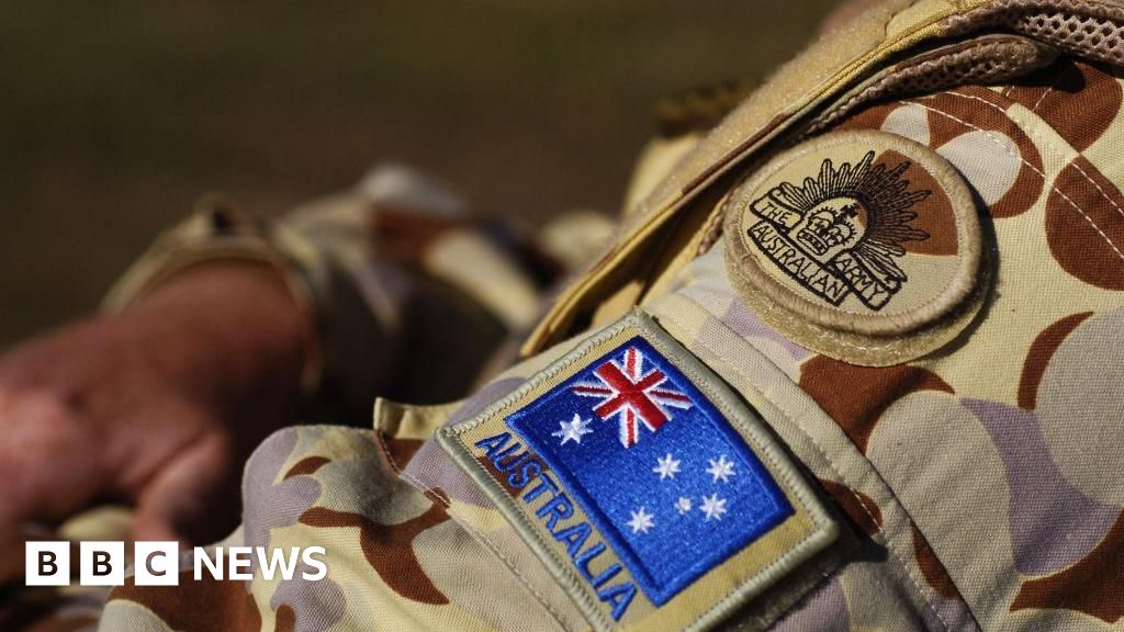 Australia strips officers' medals for war crimes culture