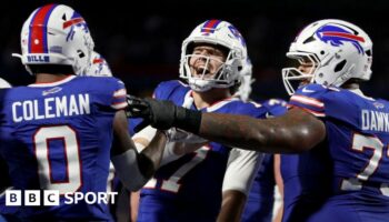 Josh Allen celebrating a touchdown with his team-mates