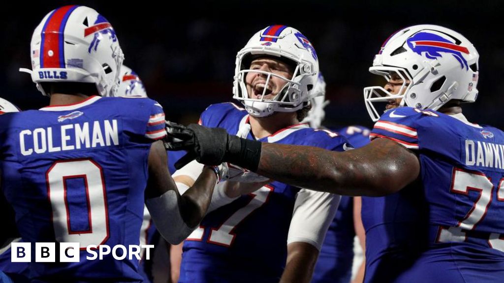 Josh Allen celebrating a touchdown with his team-mates