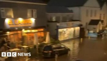 Flash floods hit south Wales after torrential rain