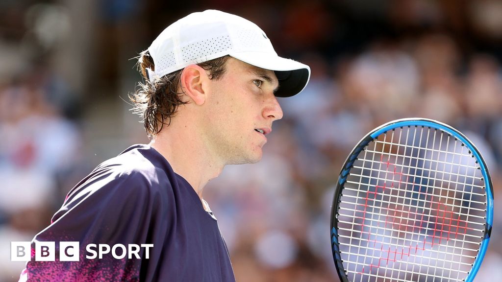 Britain's Jack Draper receives treatment for an abdominal injury before retiring midway through match against Carlos Alcaraz at Indian Wells