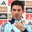 Mikel Arteta gestures towards a reporter